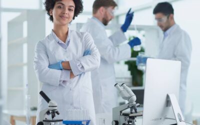 Scientists smiling together in lab